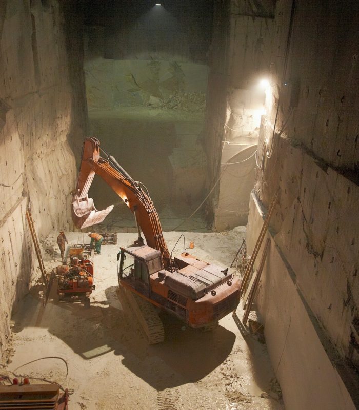 Excavator in a marble quarry